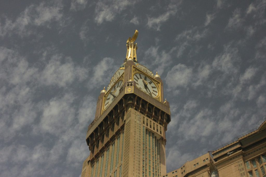 a tall clock tower with a sky background